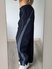 Gestreifte Baggy-Jogginghose im Vintage-Stil in Marineblau | Corissa